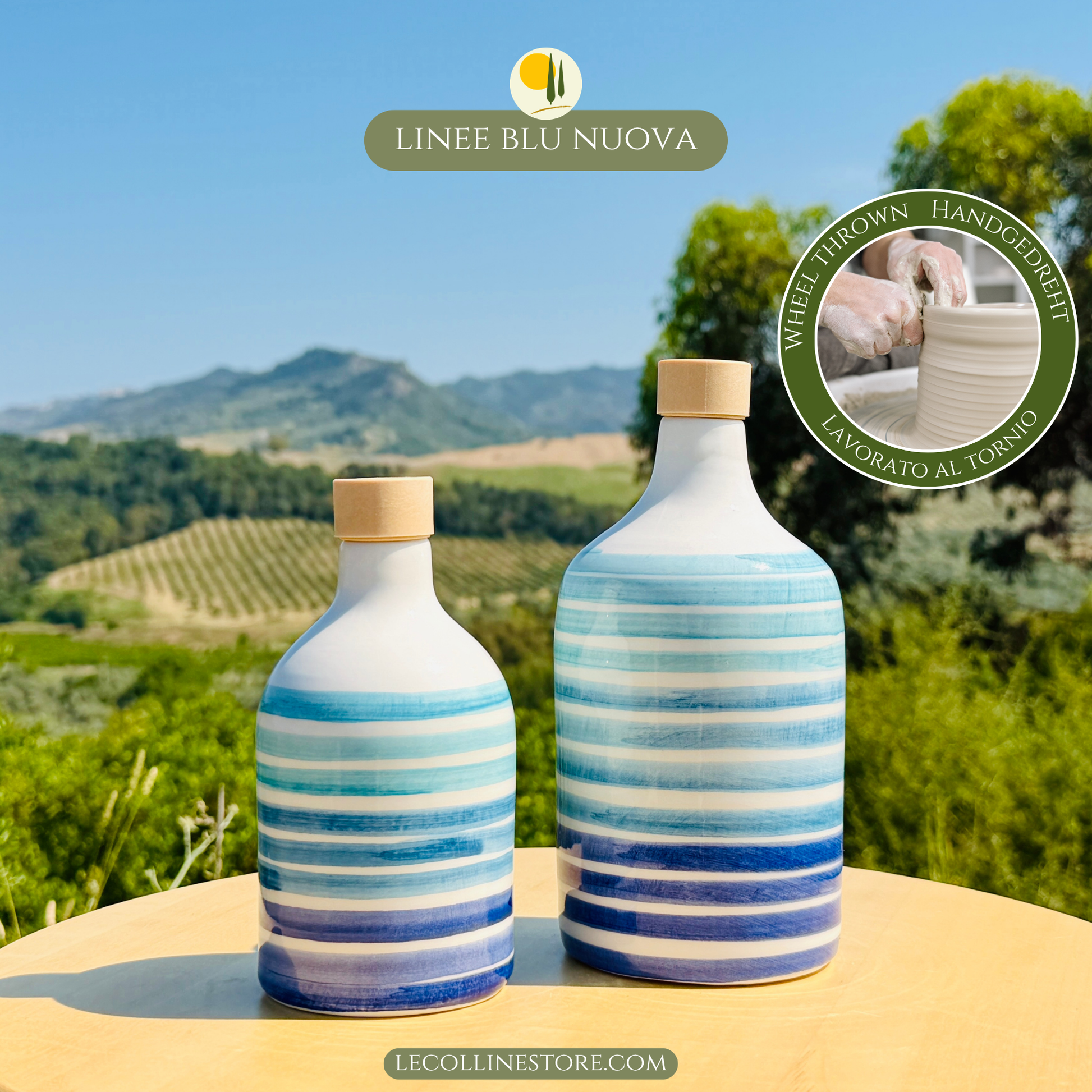 Pair of handcrafted blue ceramic oil bottles with stainless steel pourers and Mediterranean design.