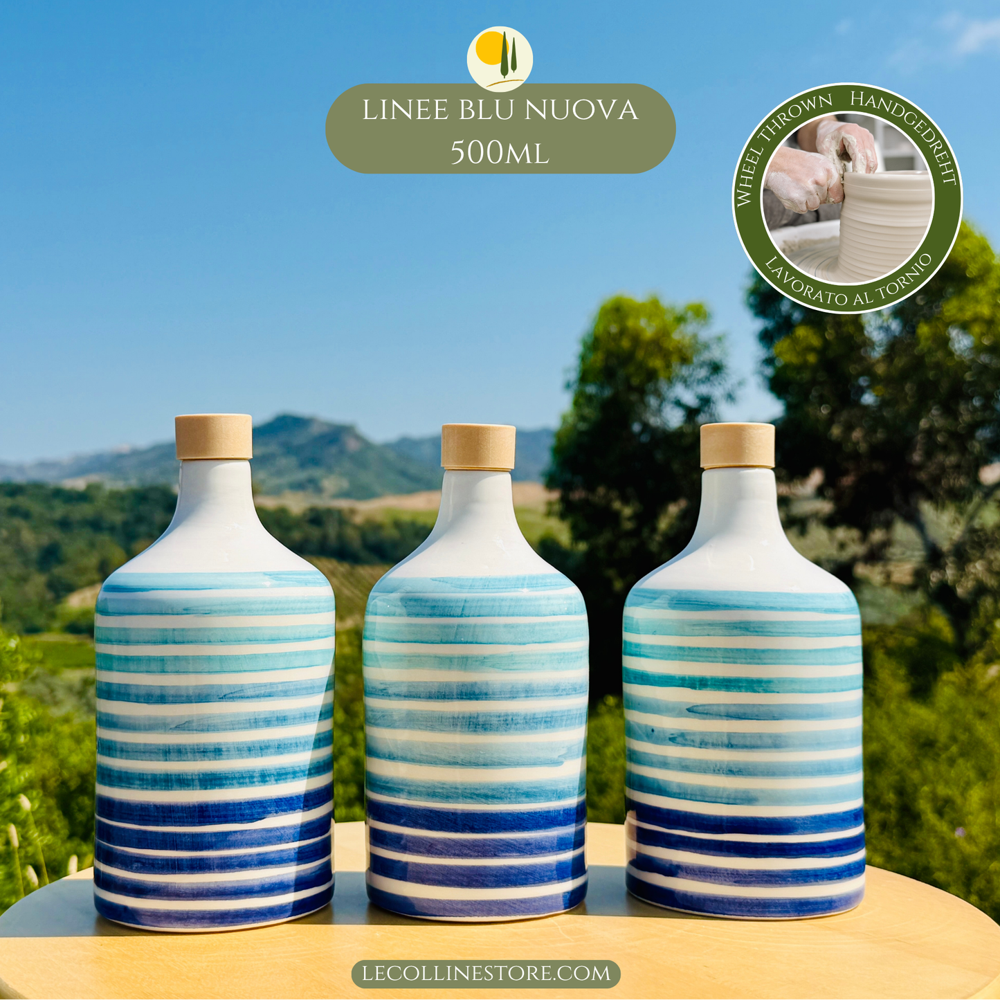 Three large 500ml handcrafted blue ceramic bottles arranged as a coordinated decorative set with Mediterranean character.