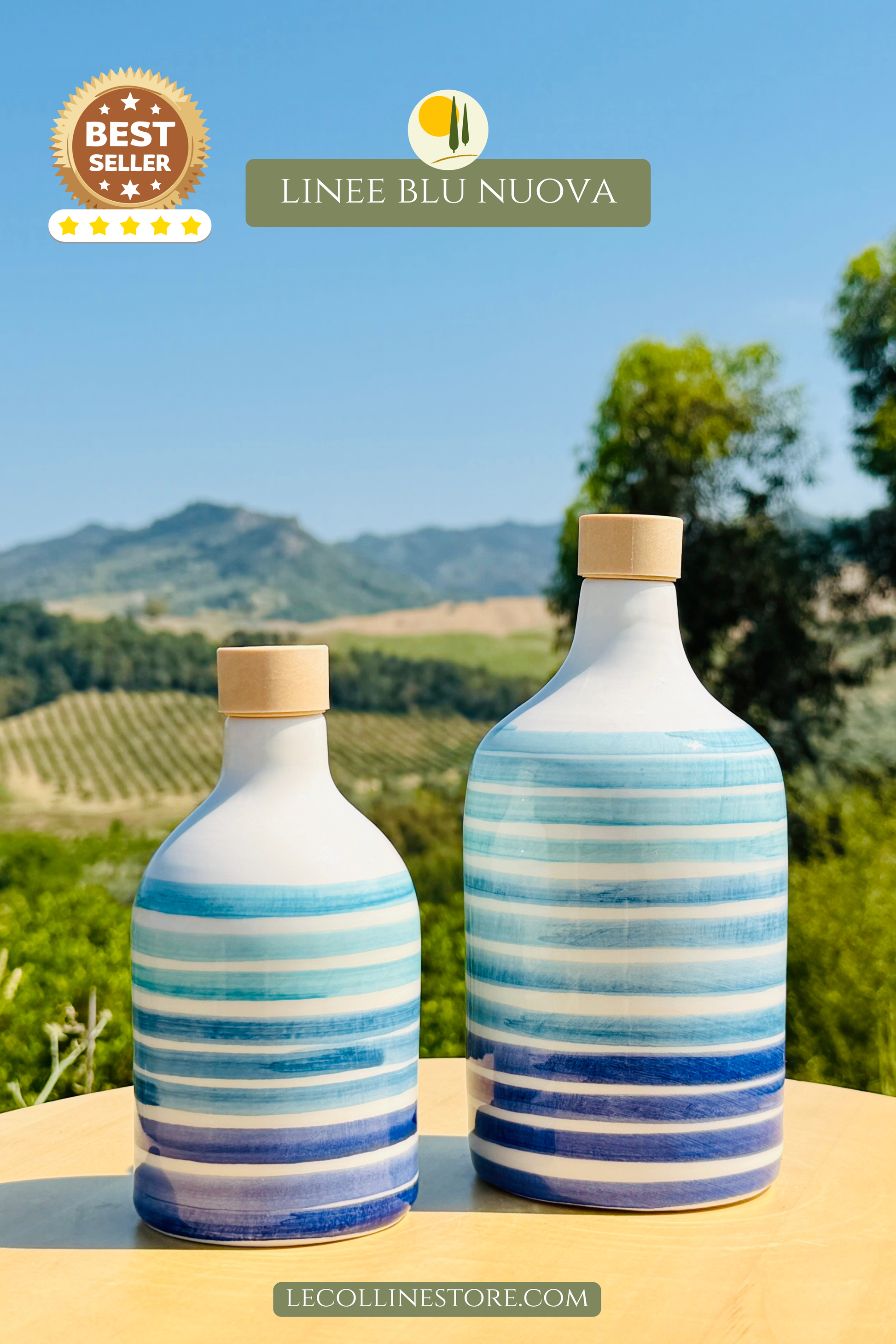 Pair of handcrafted blue striped ceramic bottles with cork stoppers, displayed in a Mediterranean landscape.
