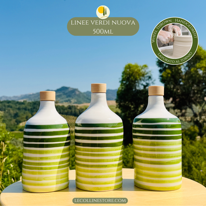 Three large 500ml handcrafted green ceramic bottles with striped decoration arranged as a matching home decor collection.