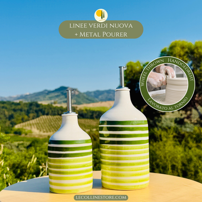 Two handcrafted green ceramic oil bottles with stainless steel pourers, suitable for kitchen and table decor.